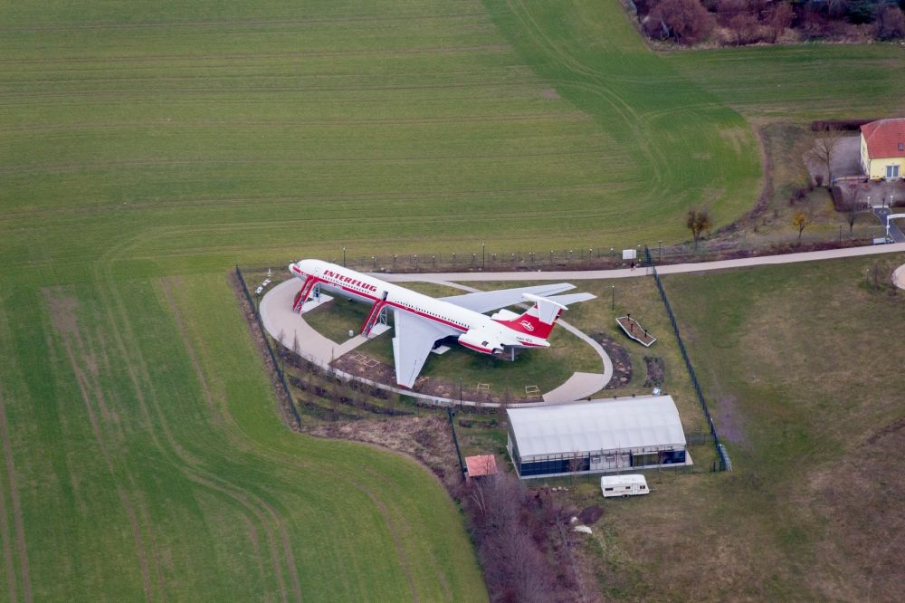 Luftbild Gollenberg - Ausgedientes Passagierflugzeug IL-62 der DDR - Fluggesellschaft INTERFLUG Lady Agnes auf einer Abstellfläche in Stölln im Bundesland Brandenburg, Deutschland
