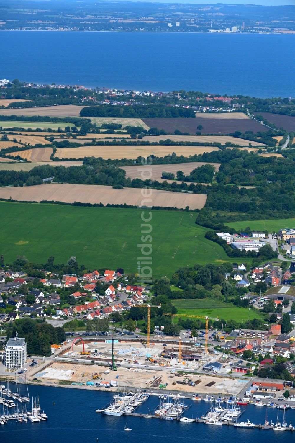 Luftbild Travemünde - Baustelle Wohngebiet einer Mehrfamilienhaussiedlung Auf dem Baggersand in Travemünde im Bundesland Schleswig-Holstein, Deutschland