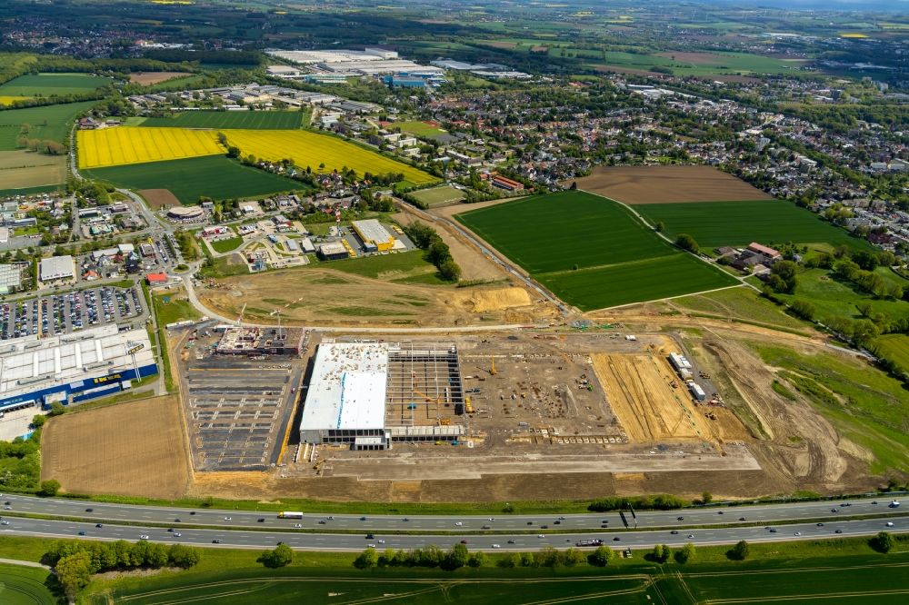 Luftbild Kamen - Baustelle zum Neubau eines Gebäudekomplexes auf dem Gelände des Logistikzentrums der Woolworth GmbH im Gewerbegebiet in Kamen im Bundesland Nordrhein-Westfalen, Deutschland