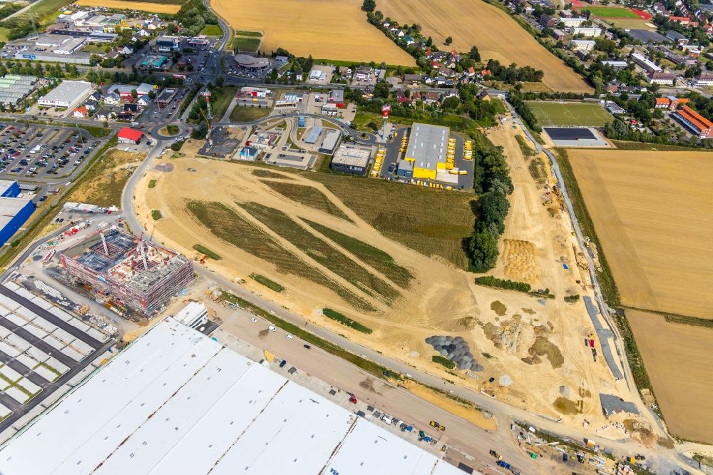 Luftaufnahme Unna - Baustelle zum Neubau eines Gebäudekomplexes auf dem Gelände des Logistikzentrums der Woolworth GmbH im Gewerbegebiet in Kamen im Bundesland Nordrhein-Westfalen, Deutschland