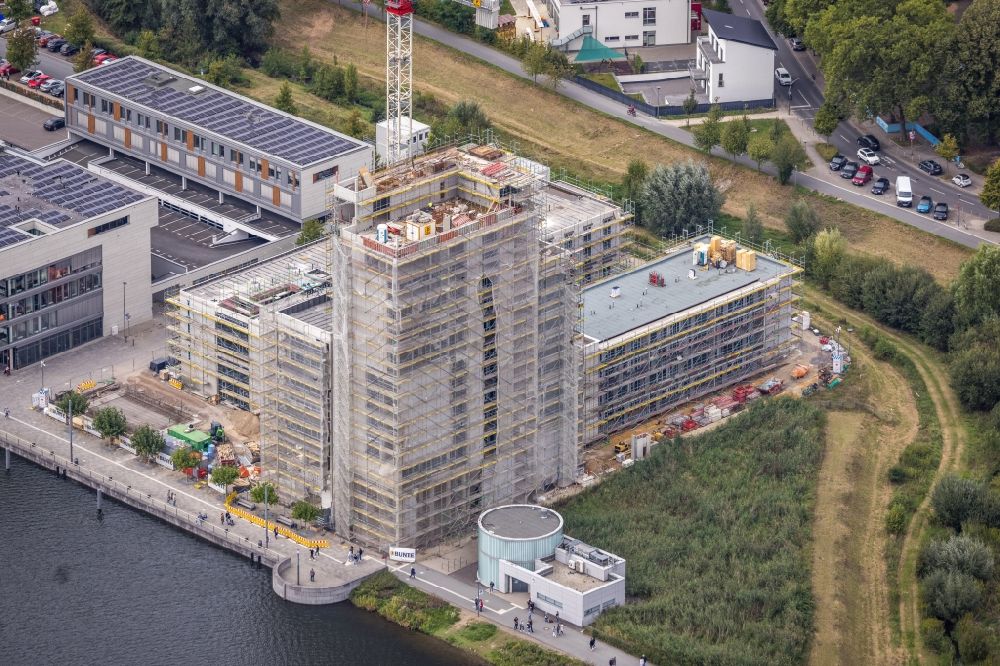Luftaufnahme Dortmund - Baustelle zum Neubau des Hochhaus Comunita Residenz am Phoenixsee in Dortmund im Bundesland Nordrhein-Westfalen, Deutschland