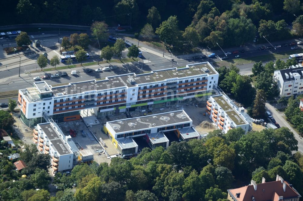 München aus der Vogelperspektive: Baustelle zum Neubau einer Mehrgenerationen- Wohnhausanlage am Scheidplatz in München im Bundesland Bayern