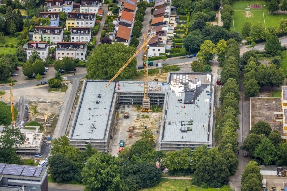 Unna von oben - Baustelle zum Neubau des Schulgebäudes mit Weiterbildungszentrum im Ortsteil Alte Heide in Unna im Bundesland Nordrhein-Westfalen, Deutschland