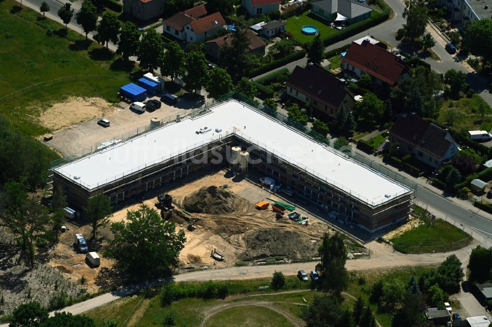 Luftbild Wildau - Baustelle zum Neubau eines Wohn- und Geschäftshauses an der Freiheitstraße in Wildau im Bundesland Brandenburg, Deutschland