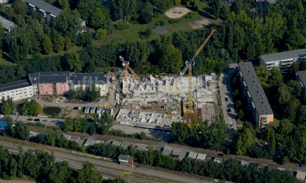 Luftbild Berlin - Baustelle zum Neubau eines Wohnhauses an der Hartriegelstraße - Moosstraße in Berlin, Deutschland