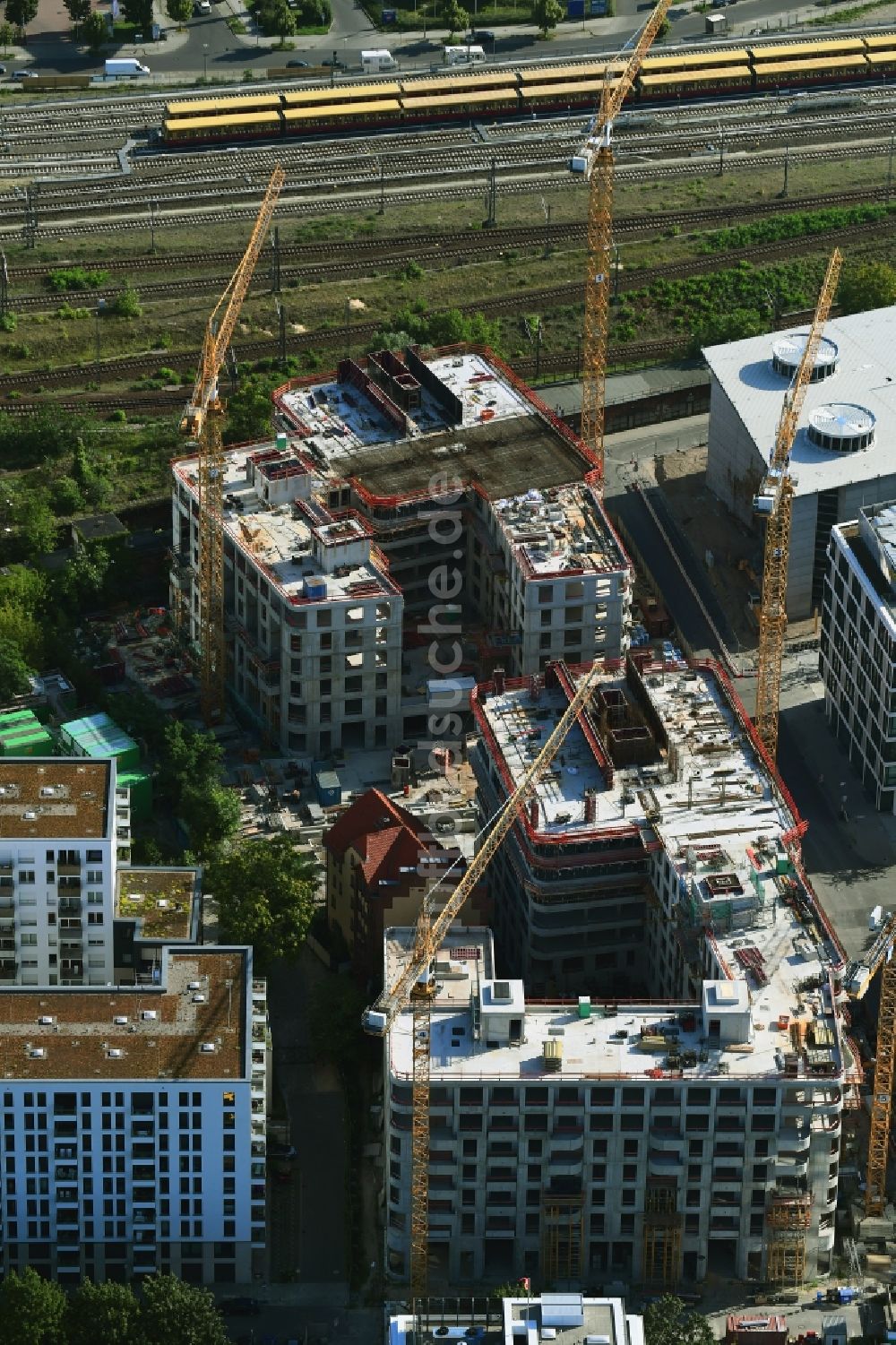 Luftbild Berlin - Baustellen zum Wohn- und Geschäftshausneubau Max & Moritz im Stadtteil Friedrichshain von Berlin