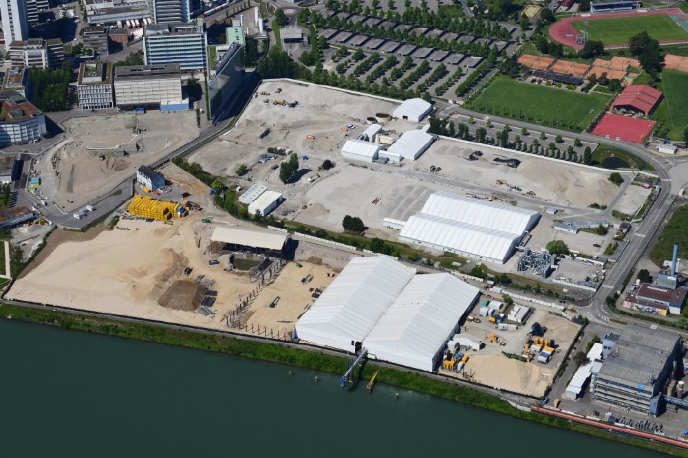 Luftbild Huningue - Überdachte Sanierung der ehemaligen Industriekläranlage ARA Steih in Huningue in Frankreich an der Grenze zu Basel, Schweiz