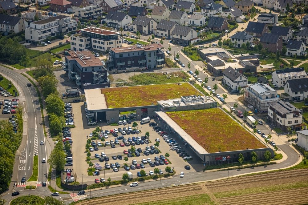 Luftbild Heiligenhaus - Einkaufs- Zentrum und Supermarkt- Filiale von Rewe an der Höseler Straße in Heiligenhaus im Bundesland Nordrhein-Westfalen, Deutschland
