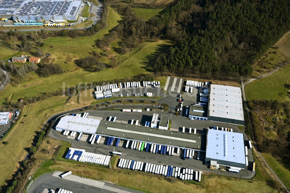Hauneck von oben - Gebäudekomplex und Gelände des Logistikzentrums Blaue Liede in Hauneck im Bundesland Hessen, Deutschland