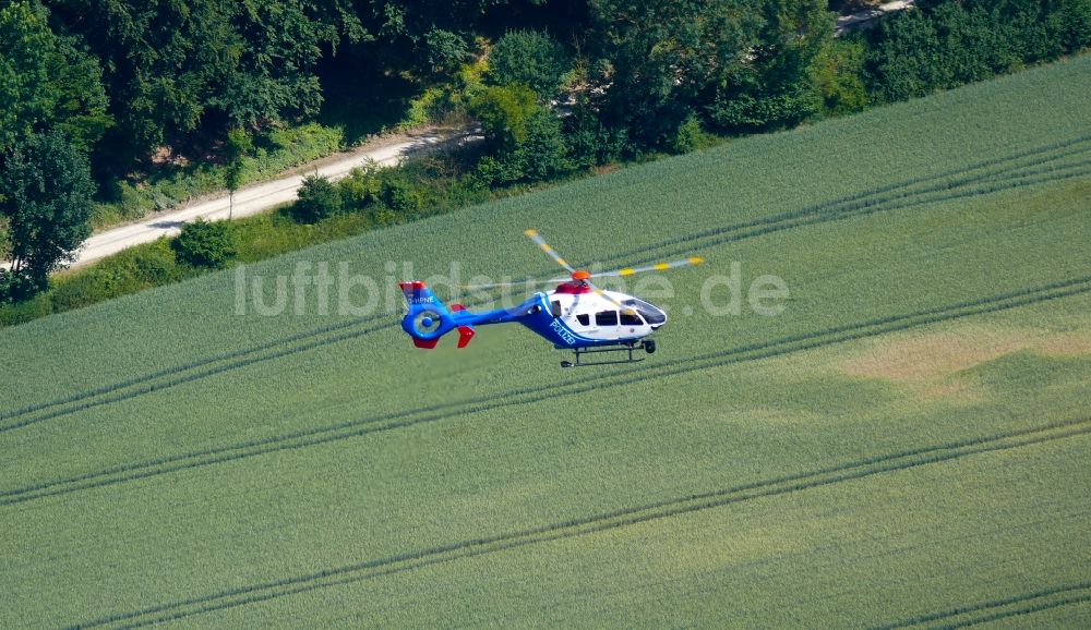 Rosdorf von oben - Helikopter - Hubschrauber der Polizei im Fluge über dem Luftraum in Rosdorf im Bundesland Niedersachsen, Deutschland