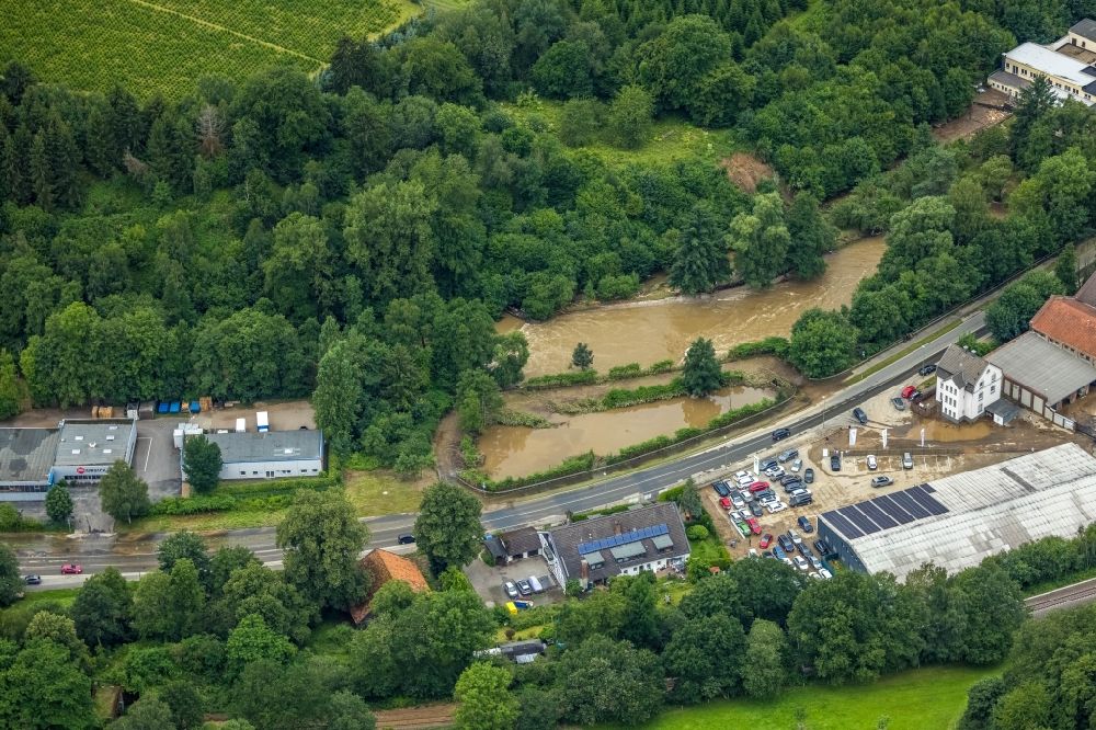 Hagen aus der Vogelperspektive: Hochwasserschäden der Flutkatastrophe am Verlauf von Ruhr und Volme in Hagen im Bundesland Nordrhein-Westfalen, Deutschland