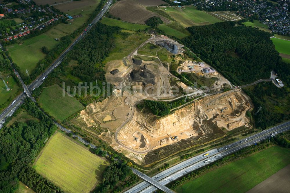 Luftaufnahme Dibbersen - Kies- Tagebau in Dibbersen im Bundesland Niedersachsen, Deutschland
