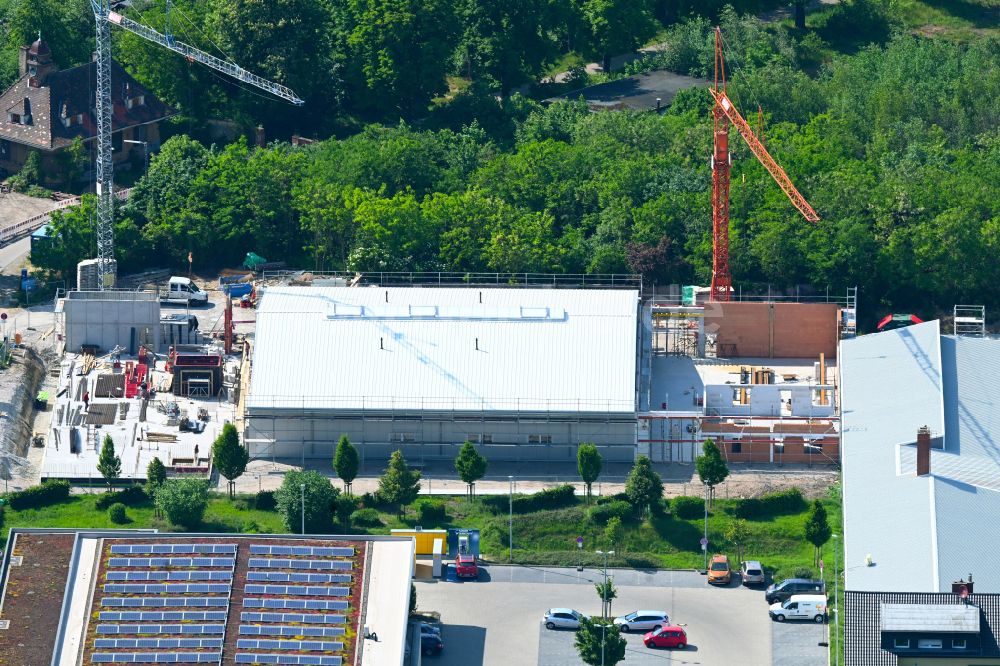 Schwetzingen von oben - Neubau - Baustelle auf dem Werksgelände der Notion Systems GmbH in Schwetzingen im Bundesland Baden-Württemberg, Deutschland