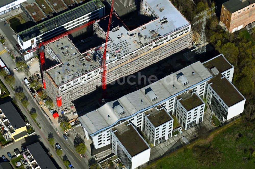 Luftbild Berlin - Neubau eines Büro- und Geschäftshaus Alex im Ortsteil Lichtenberg in Berlin, Deutschland