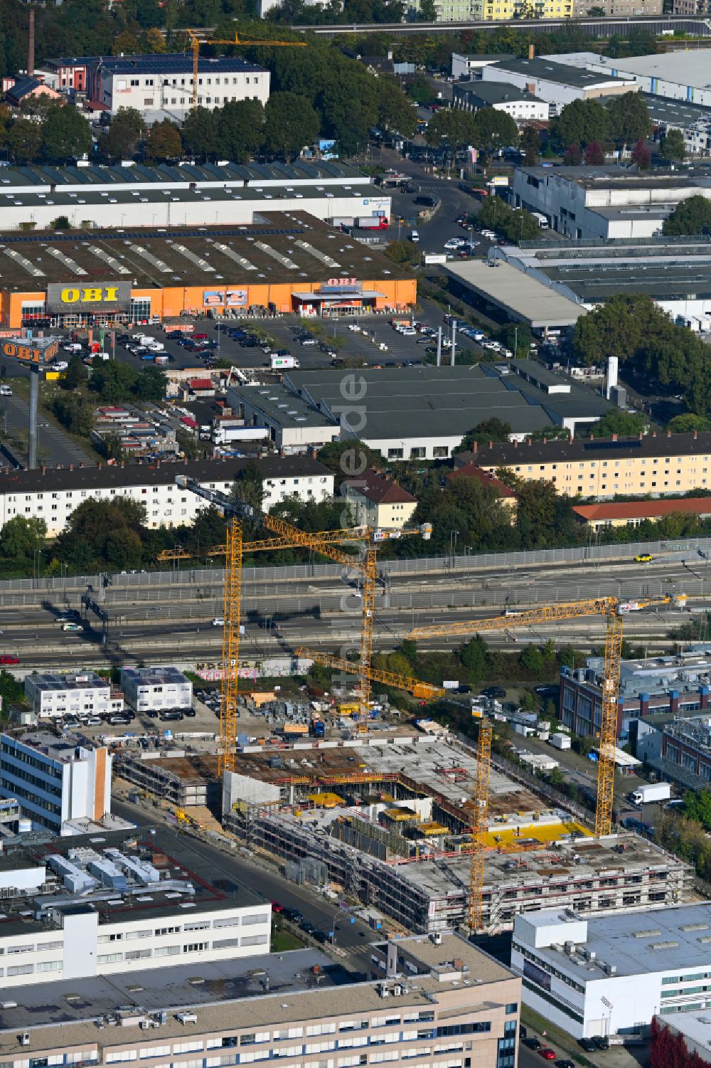 Luftbild Berlin - Neubau eines Büro- und Geschäftshauses INK Berlin - Inspire Neukölln an der Ballinstraße - Woermannkehre in Berlin, Deutschland