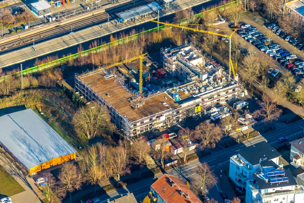 Luftaufnahme Holzwickede - Neubau Wohn- und Geschäftshaus an der Bahnhofstraße in Holzwickede im Bundesland Nordrhein-Westfalen, Deutschland