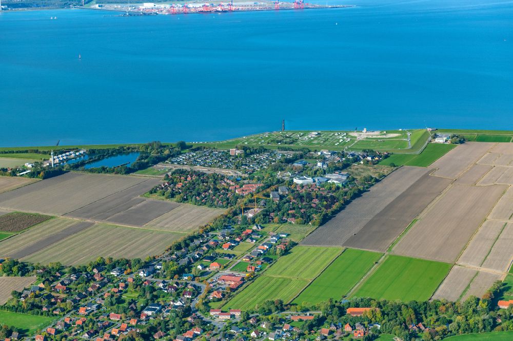 Luftaufnahme Butjadingen - Ortsansicht von Tossens in Butjadingen im Bundesland Niedersachsen, Deutschland