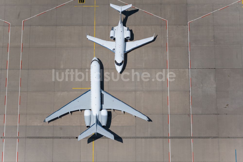 Luftaufnahme Filderstadt - Passagierflugzeuge auf der Parkposition - Abstellfläche auf dem Flughafen Stuttgart in Filderstadt im Bundesland Baden-Württemberg, Deutschland
