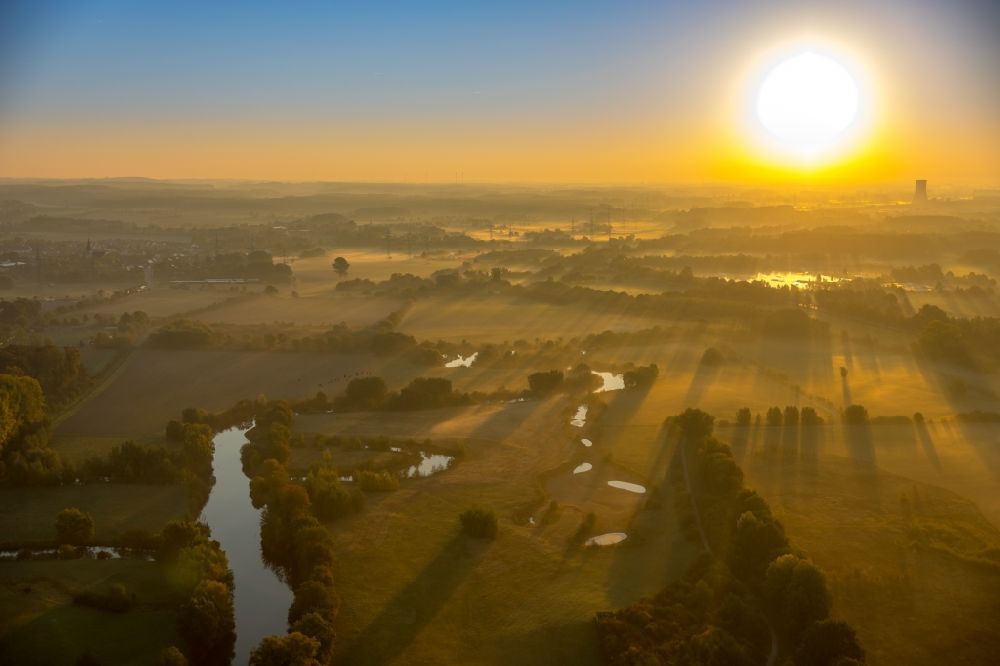 Luftbild Hamm - Sonnenaufgang über der Landschaft Oberwerrieser Mersch in Hamm im Bundesland Nordrhein-Westfalen, Deutschland
