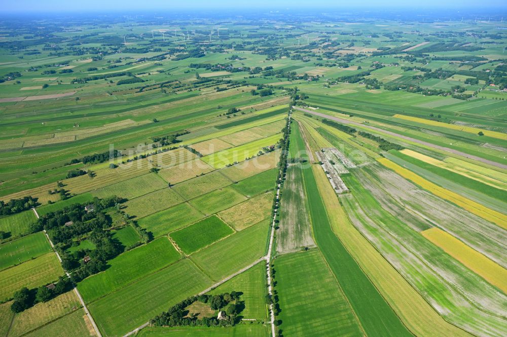 Luftaufnahme Ovelgönne - Strukturen auf landwirtschaftlichen Feldern in Ovelgönne im Bundesland Niedersachsen, Deutschland