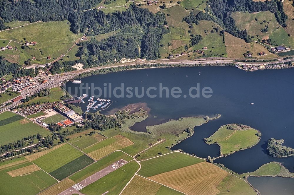 Luftaufnahme Alpnach - Uferbereiche des Sees bei Alpnachstad am Luzerner See in Alpnach im Kanton Obwalden, Schweiz