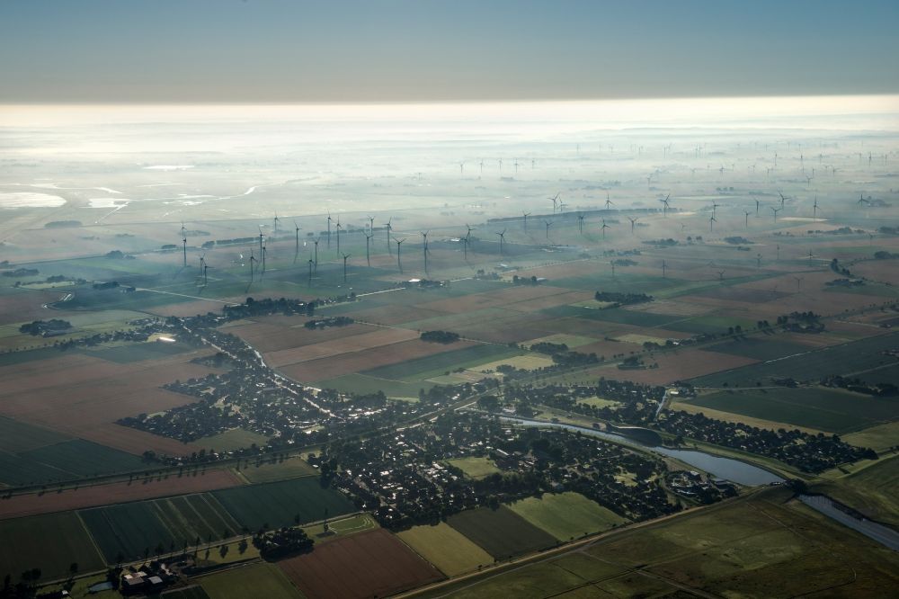 Luftbild Friedrichskoog - Windenergieanlagen (WEA) - Windrad- auf einem Feld im Ortsteil Hamburg Metropolitan Area in Friedrichskoog im Bundesland Schleswig-Holstein