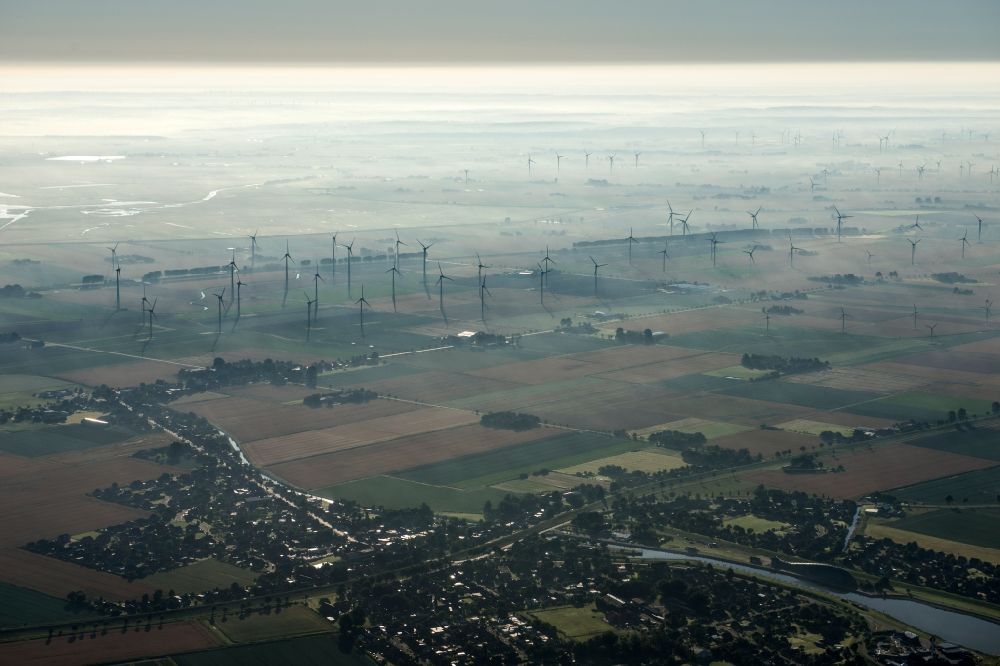 Luftaufnahme Friedrichskoog - Windenergieanlagen (WEA) - Windrad- auf einem Feld im Ortsteil Hamburg Metropolitan Area in Friedrichskoog im Bundesland Schleswig-Holstein