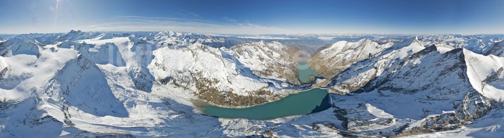 Luftbild Kaprun - Winterlich schneebedecktes Panorama der Felsen- und Berglandschaft am Stausee Wasserfallboden und Mooserboden in Kaprun in Österreich