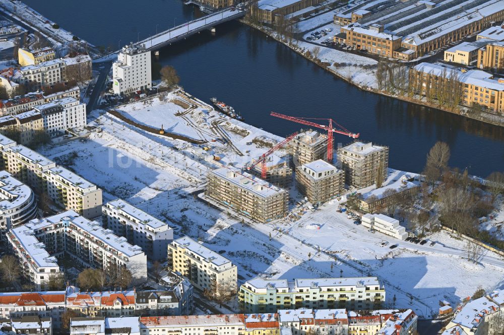 Berlin von oben - Winterluftbild Baustelle zum Neubau einer Mehrfamilienhaus-Wohnanlage Quartier WOHNWERK in Berlin, Deutschland