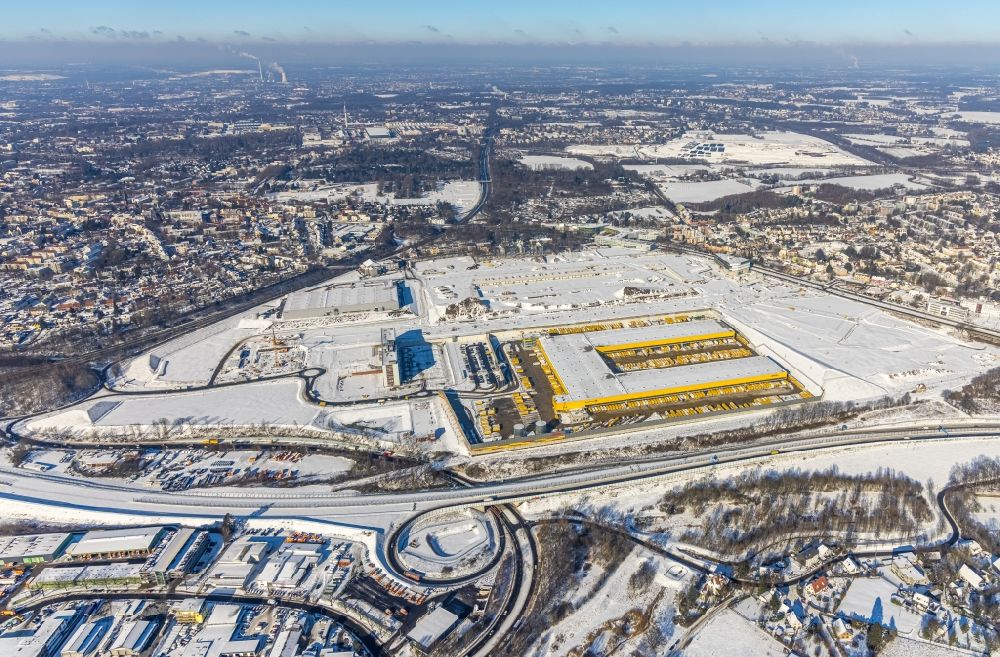 Luftaufnahme Bochum - Winterluftbild Neubau eines DHL- Hub- Gebäudekomplexes auf dem Gelände des Logistikzentrums im Entwicklungsgebiet MARK 51°7 in Bochum im Bundesland Nordrhein-Westfalen, Deutschland