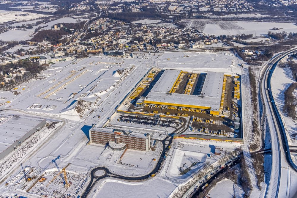 Bochum aus der Vogelperspektive: Winterluftbild Neubau eines DHL- Hub- Gebäudekomplexes auf dem Gelände des Logistikzentrums im Entwicklungsgebiet MARK 51°7 in Bochum im Bundesland Nordrhein-Westfalen, Deutschland