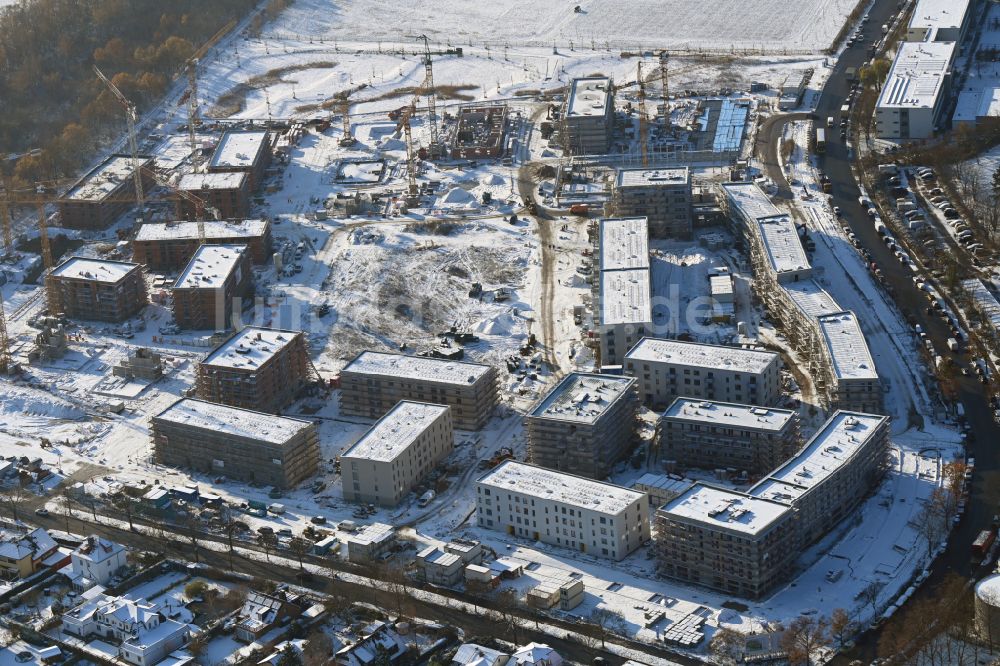 Luftaufnahme Berlin - Winterluftbild Neubau einer Mehrfamilienhaus-Wohnanlage Buckower Felder in Berlin, Deutschland