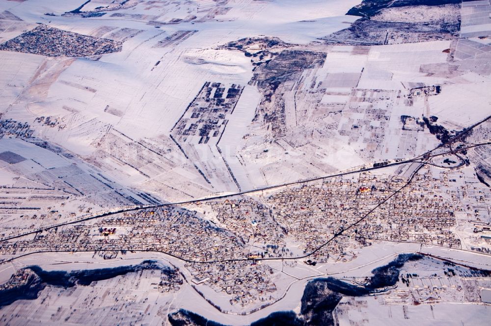 Luftbild Budesti - Winterluftbild Ortsansicht am Rande von landwirtschaftlichen Feldern in Budesti in Chisinau, Moldawien